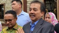 Roy Suryo = Tersangka